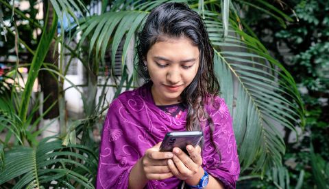 Girl checking her mobile phone