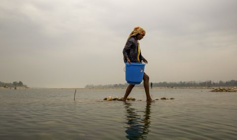 woman fishing in sea