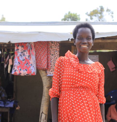Gloria trained as a tailor, learning how to sew and run her own small business