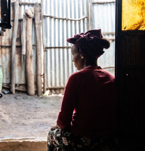 Woman looking out and away