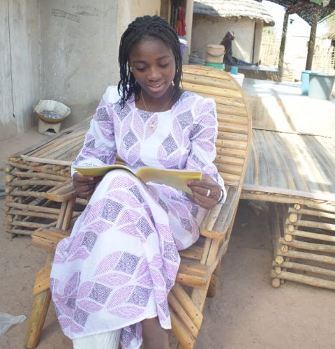 Girl reading her book