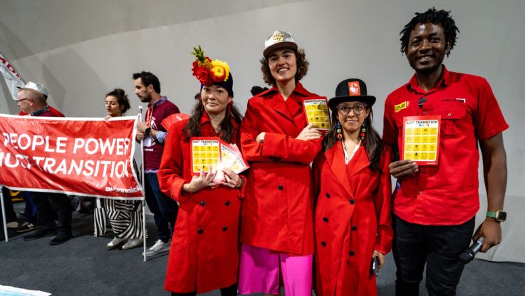 Activists at COP 30 posing for a photo