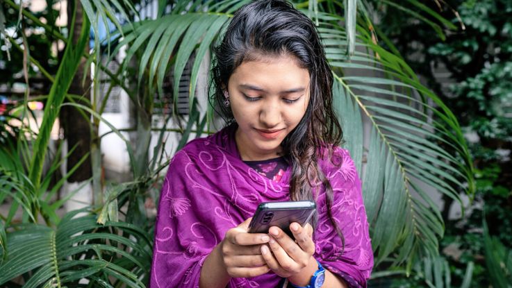 Girl checking her mobile phone